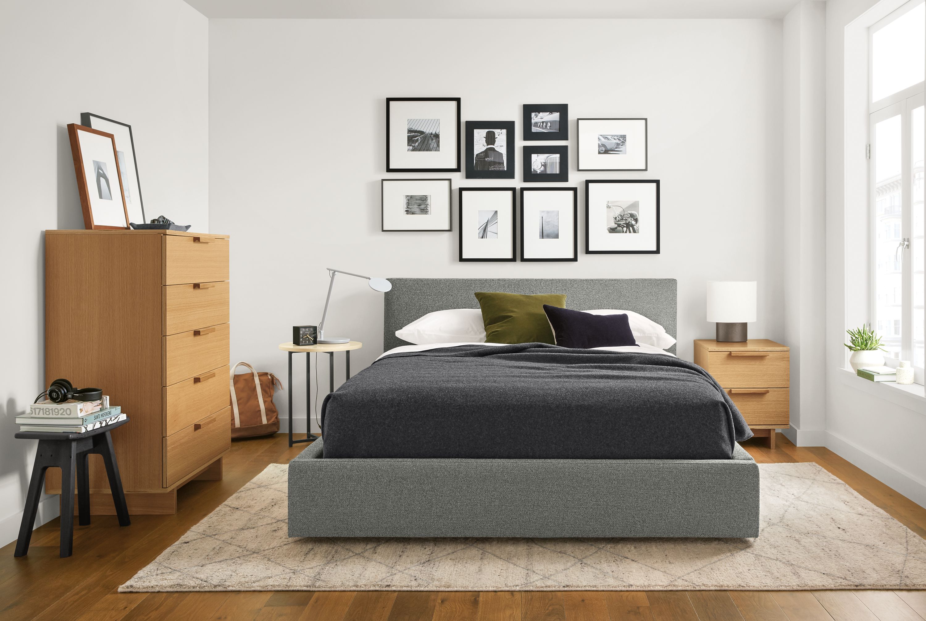 Bedroom with Wyatt queen storage bed in Tatum Spruce and Ashby dresser and nightstand in white oak veneer.