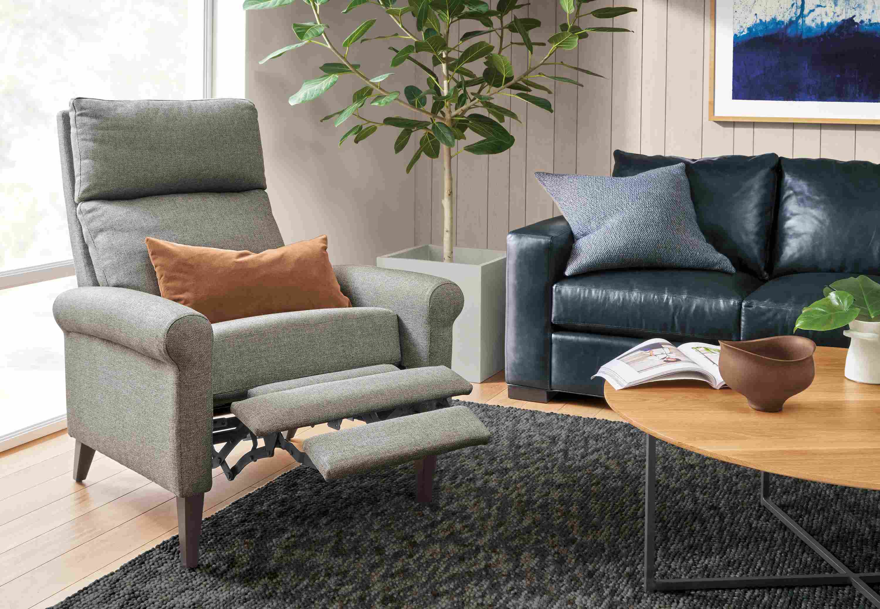 Detail of Wynton Select Recliner in Sumner Graphite fabric with footrest extended.