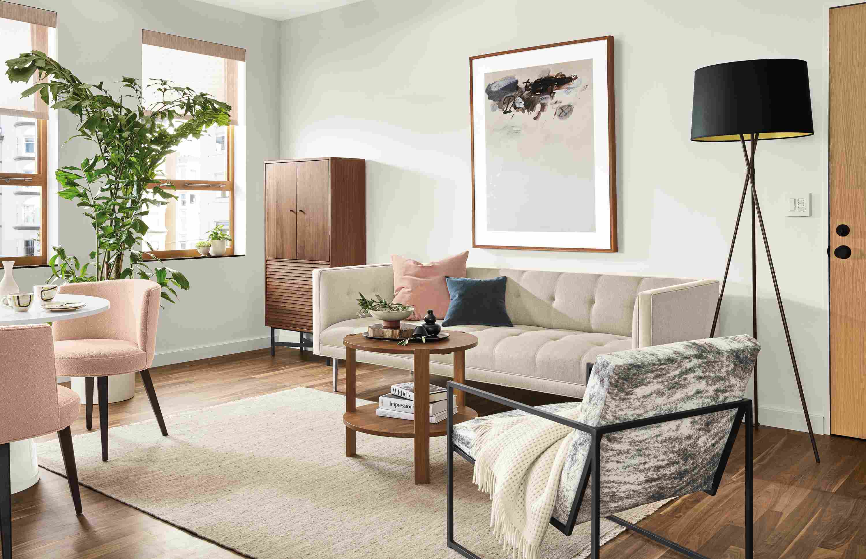 Detail of Wynwood sofa in Sumner Linen fabric and Banks Natural velvet accent in living room.