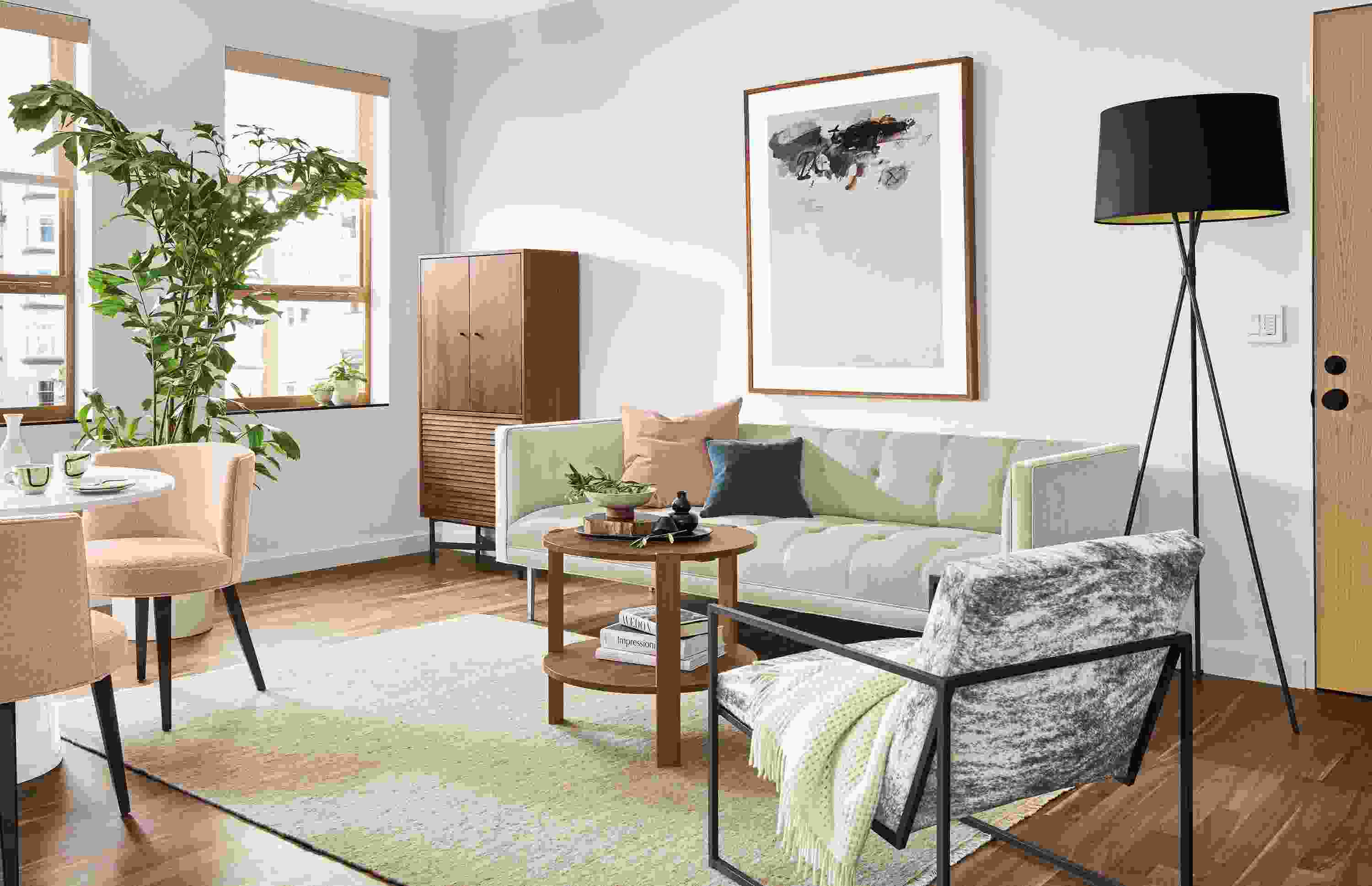 Detail of Wynwood sofa in Sumner Linen fabric and Banks Natural velvet accent in living room.