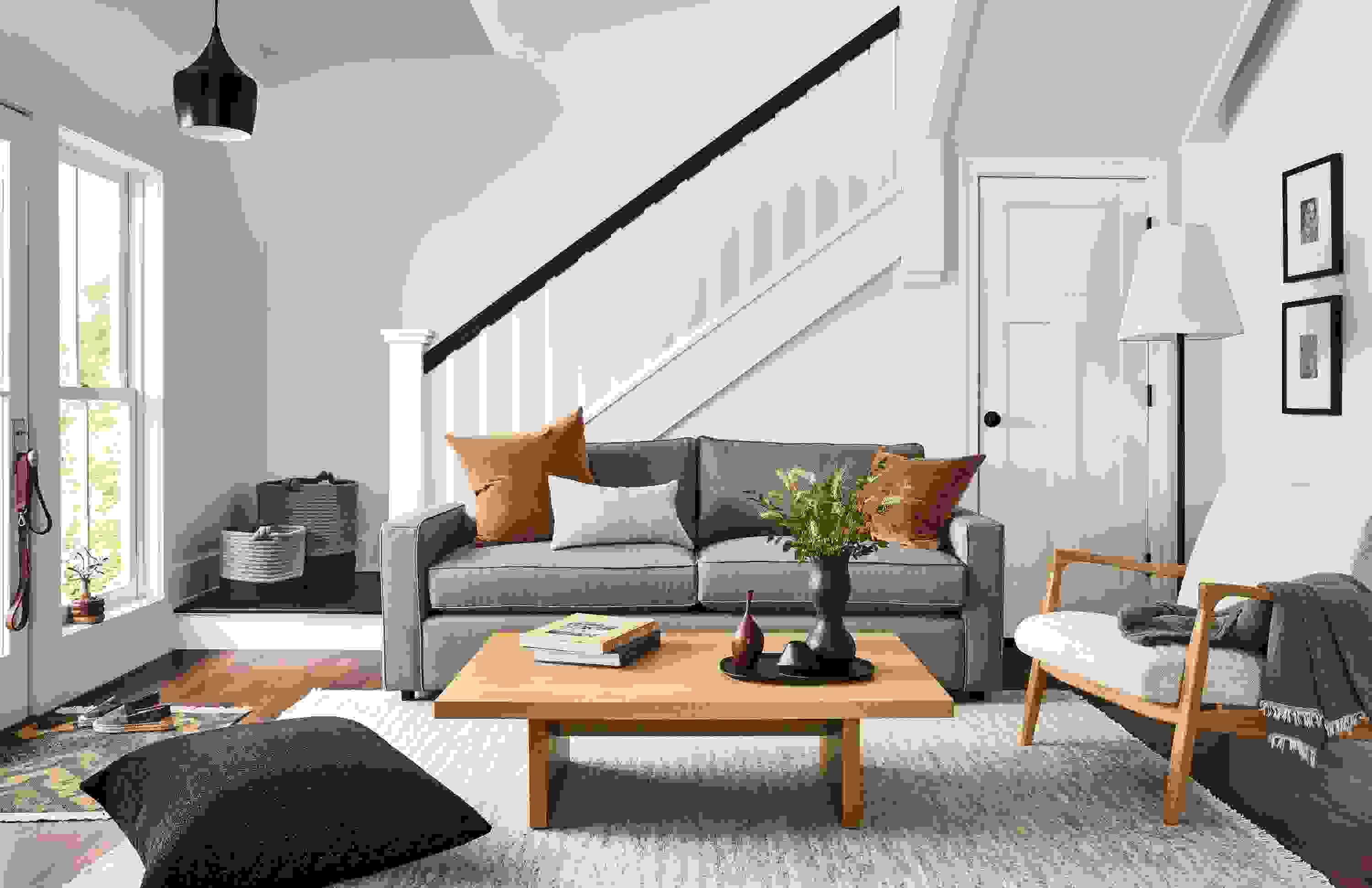 room setting including york 87-wide sofa in dawson cement, callan chair, corbett coffee table, dia rug.