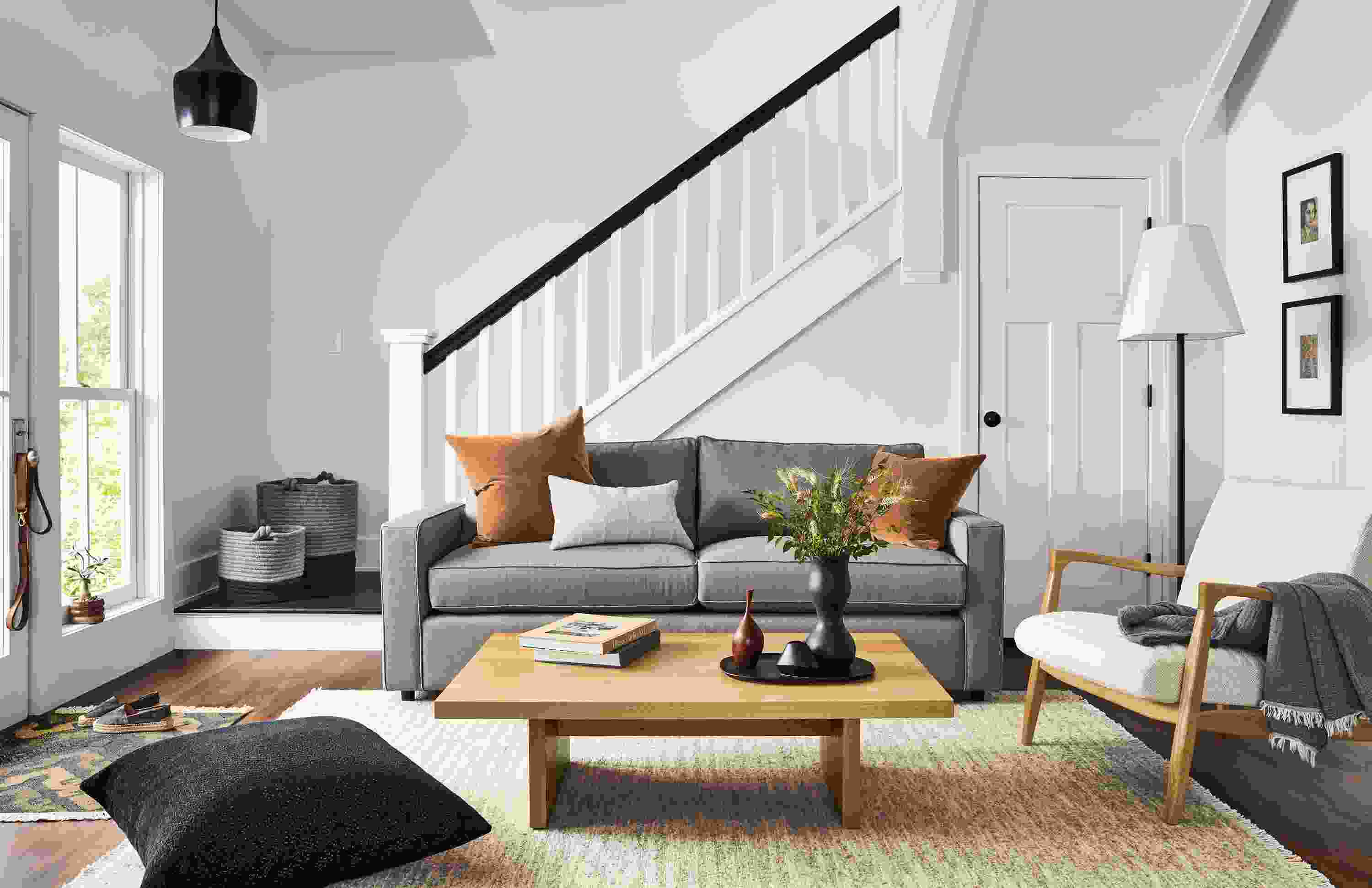 room setting including york 87-wide sofa in dawson cement, callan chair, corbett coffee table, dia rug.