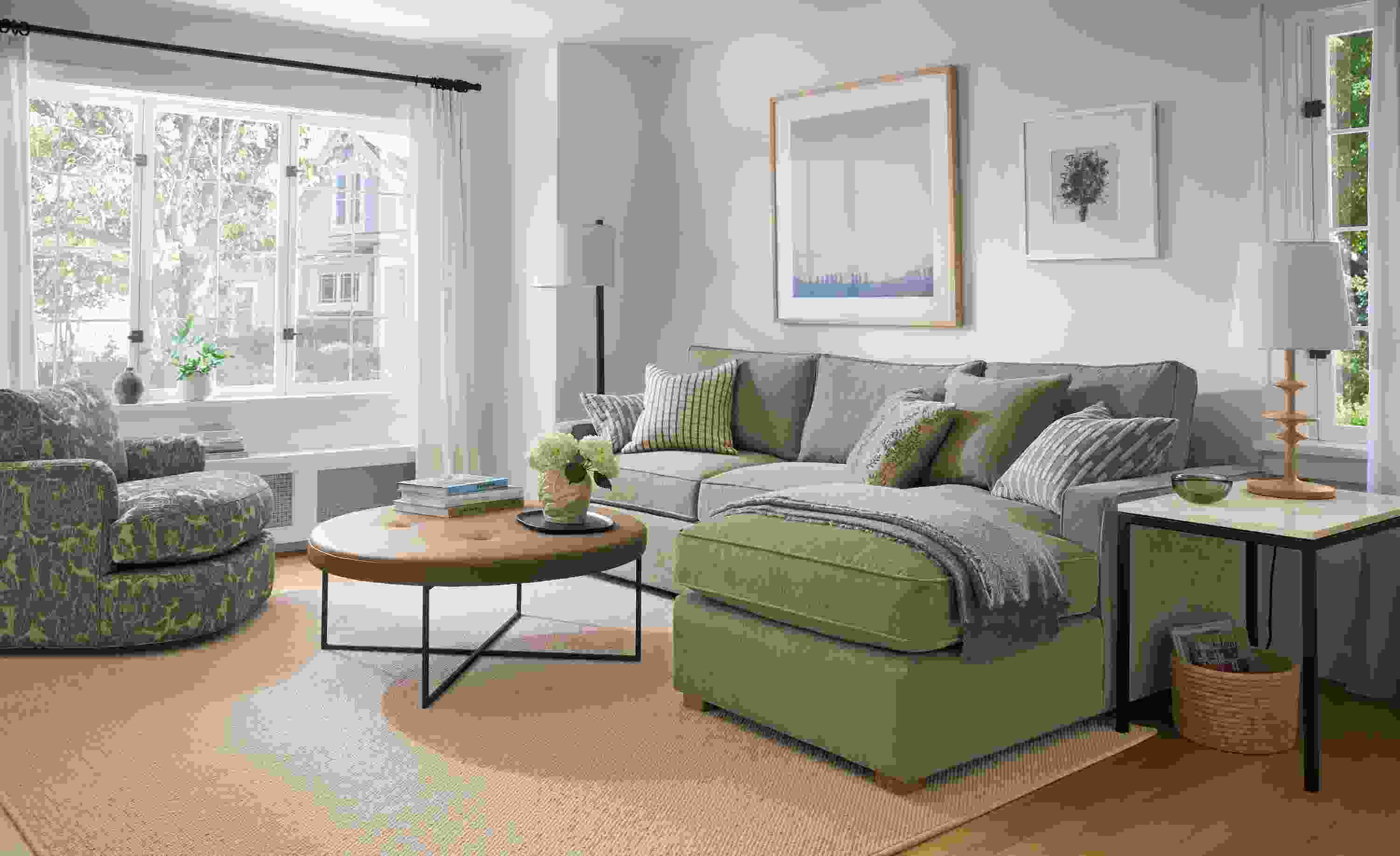 Living room with York sofa in Crawford Putty, Sonja swivel chair in Caldwell Olive and Flannery rug in Oatmeal.