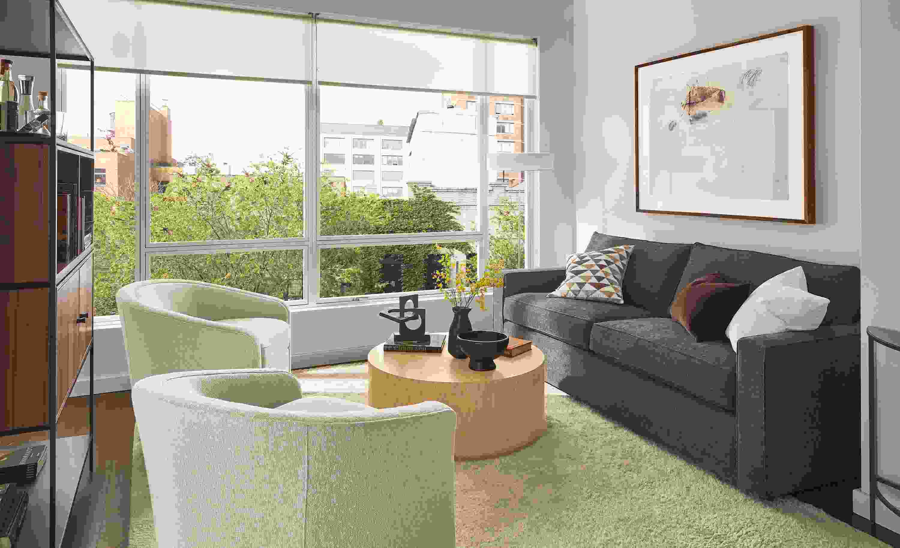 Living room with York 87-wide sofa, Amos chairs, Liam coffee table.