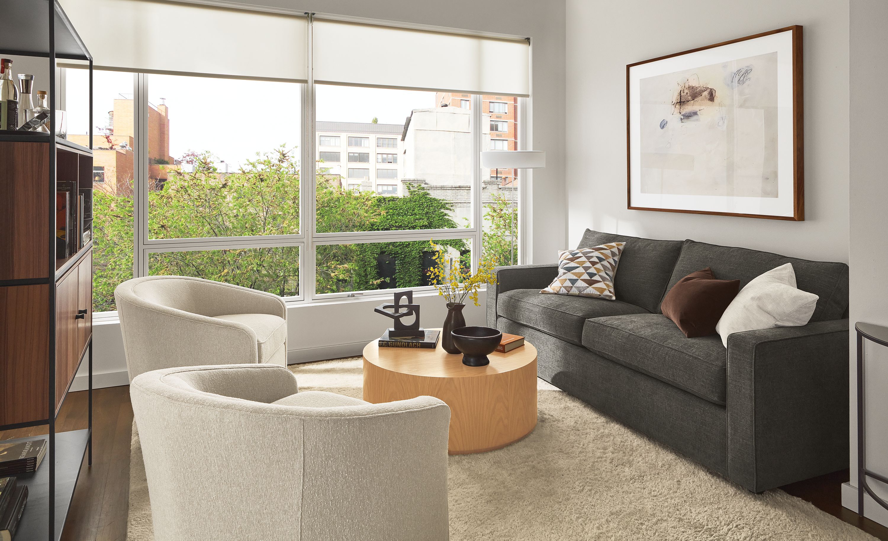 Living room with York 87-wide sofa, Amos chairs, Liam coffee table.