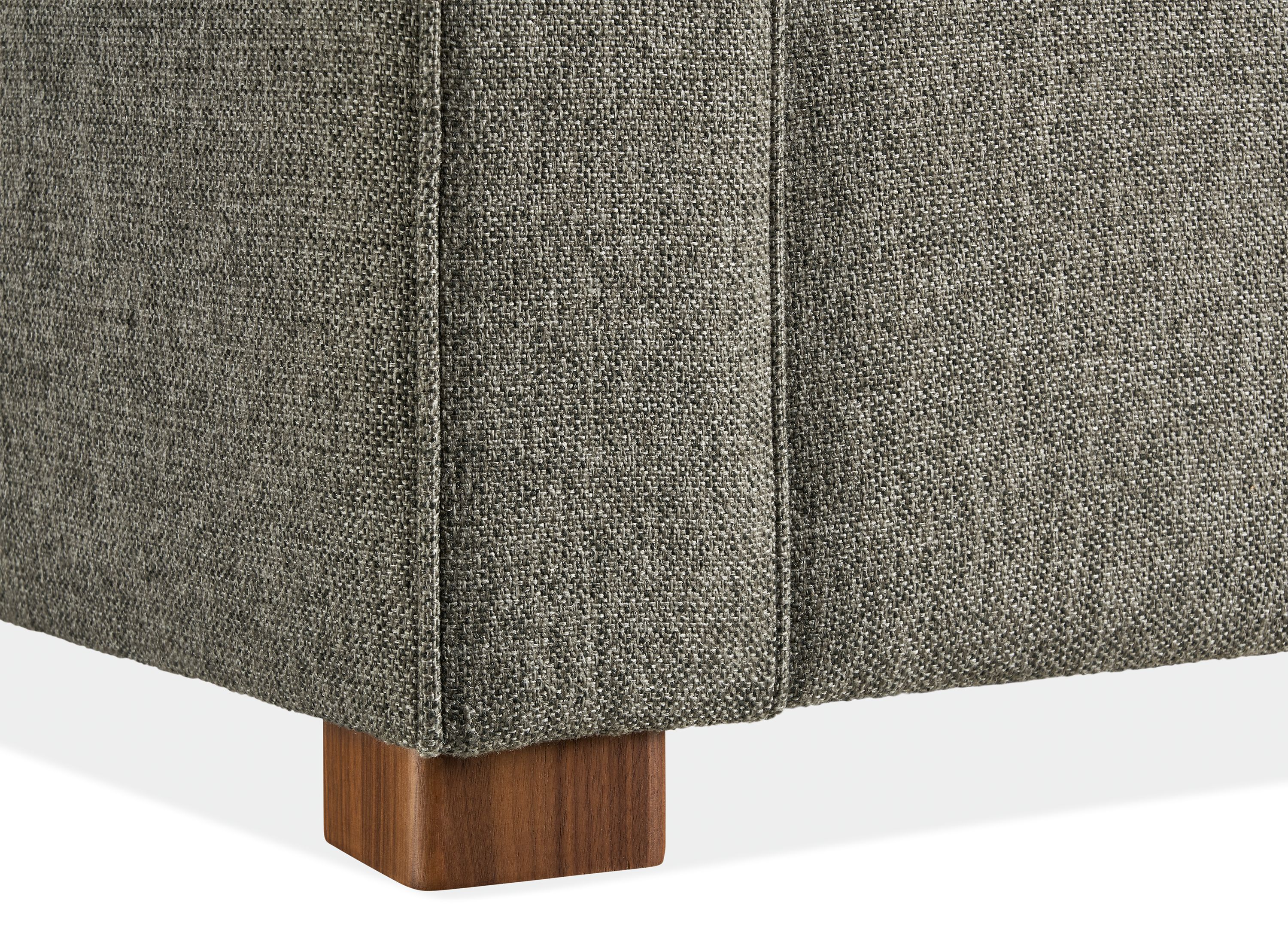 corner detail of the walnut leg on a york sofa.